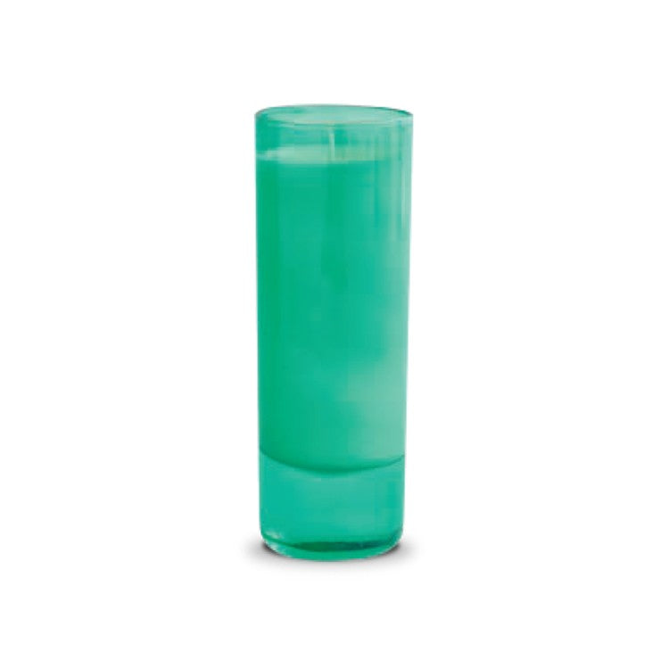 Tall glass filled with green liquid against white background.