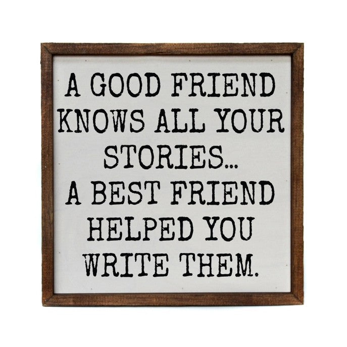 Sign with friendship quote in a wooden frame.