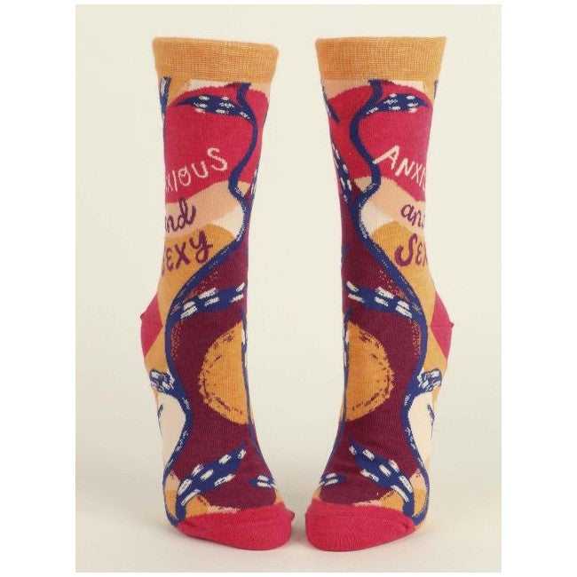 Colorful socks with a playful "Anxious and Sexy" design.