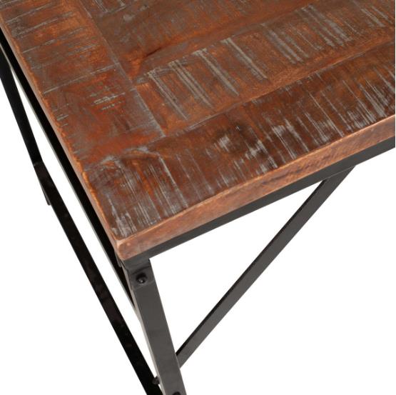 Wooden table with black metal legs and a rustic finish.