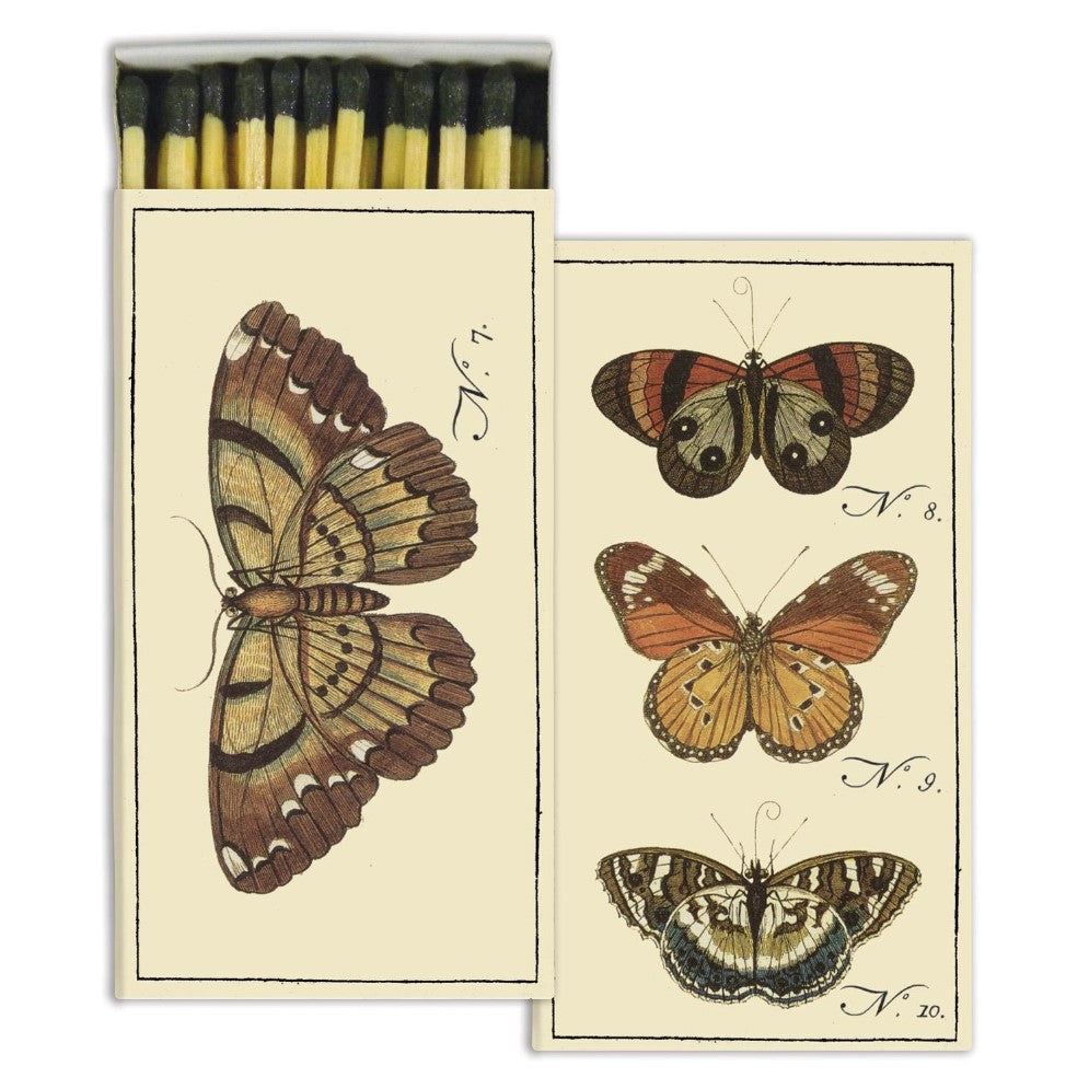 Vintage butterfly illustrations on a matchbox set.