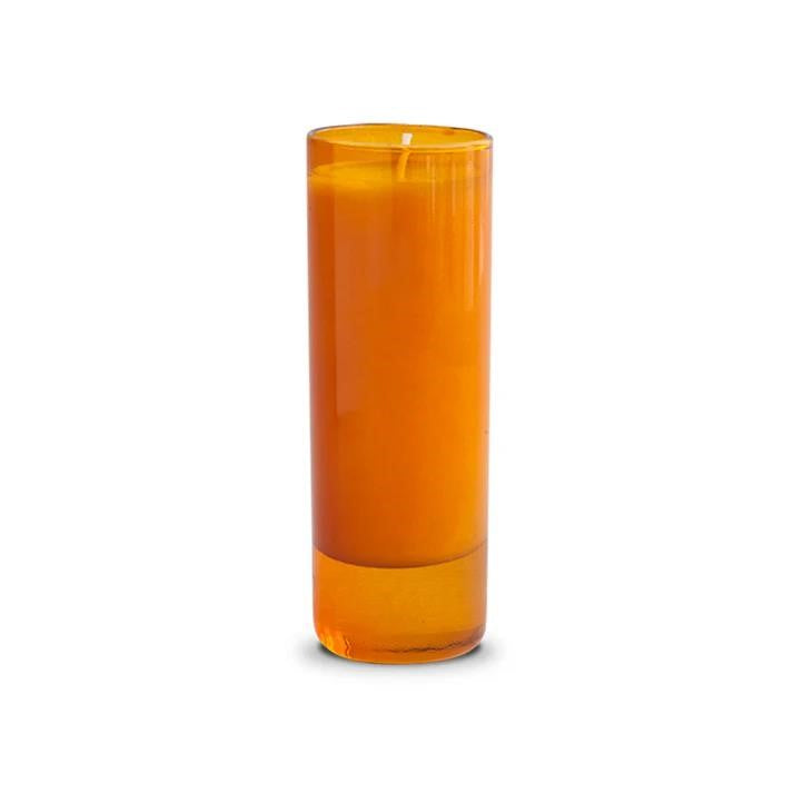 Tall orange glass candle, unlit, isolated on a white background.