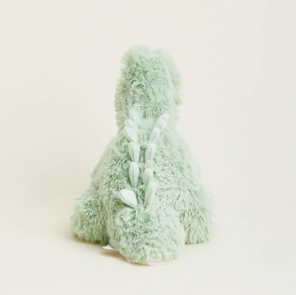 Fluffy green dinosaur plushie, back view.