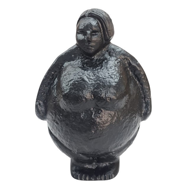 Black stone sculpture of a rounded figure.