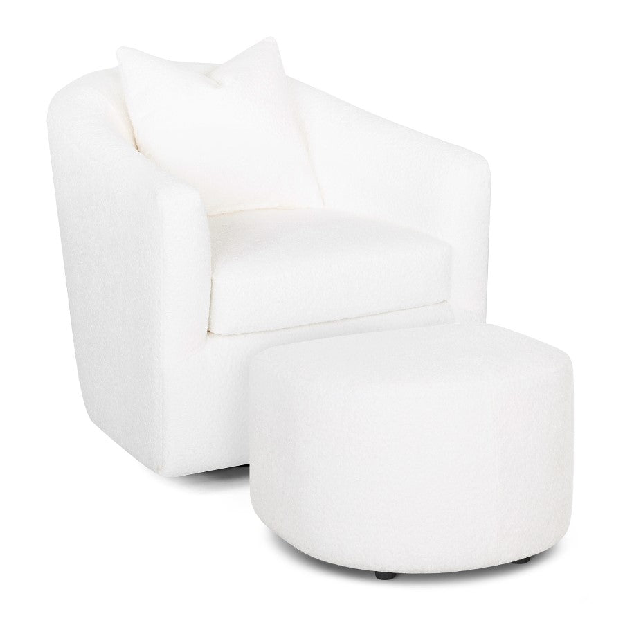 White armchair with ottoman and cushion.