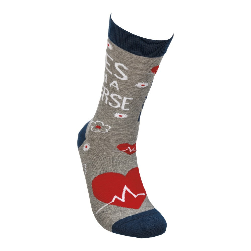 Grey sock with medical designs and navy accents.