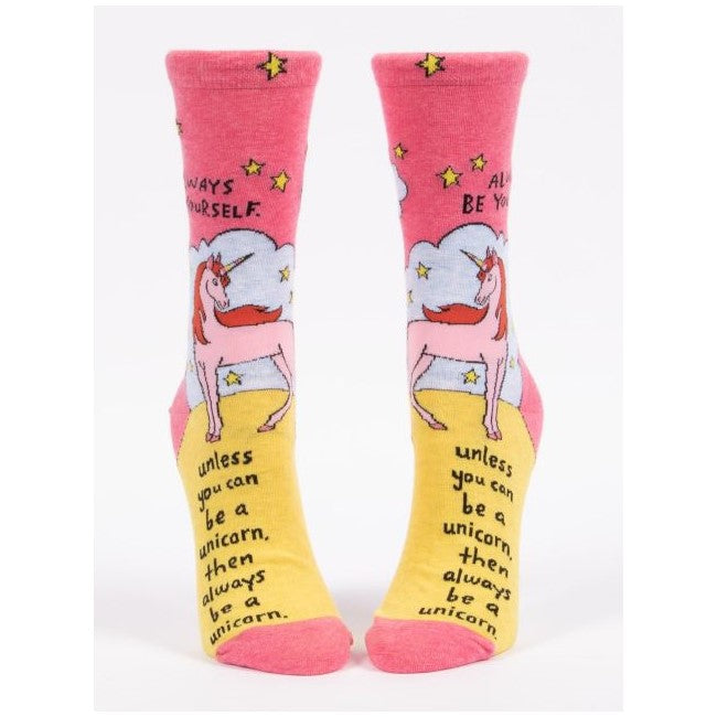 Pink unicorn socks with motivational quote.