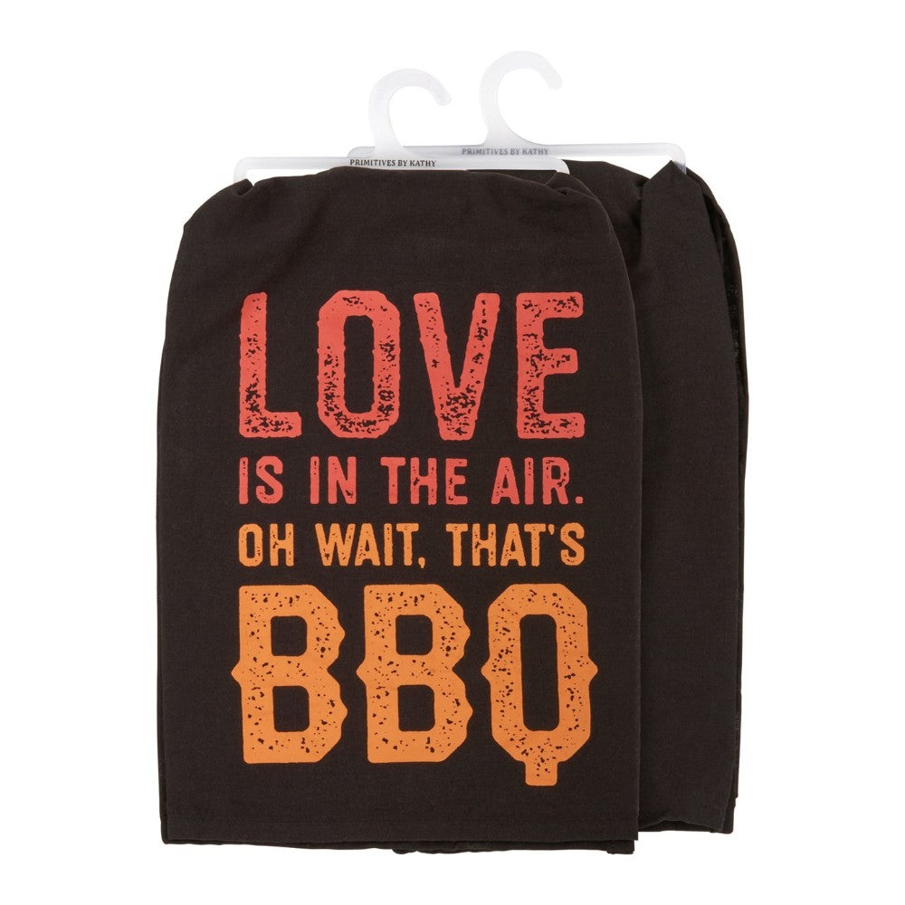 Black towel with humorous BBQ-themed text.