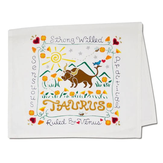 Taurus-themed cloth with bull, flowers, and zodiac traits.