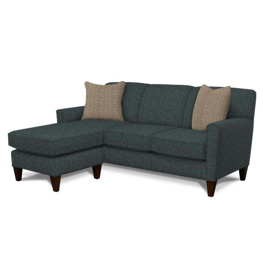 A dark teal L-shaped sofa with beige cushions.
