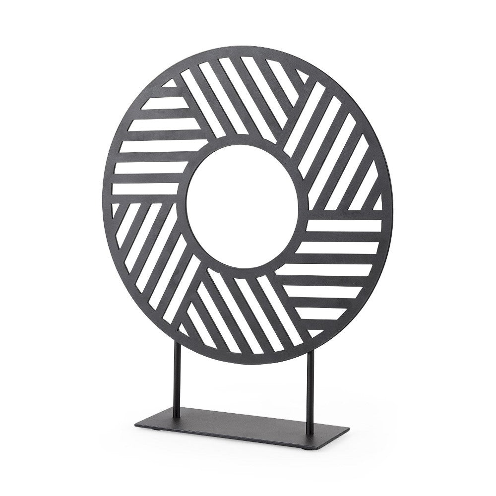 A geometric metal sculpture with diagonal and horizontal lines.