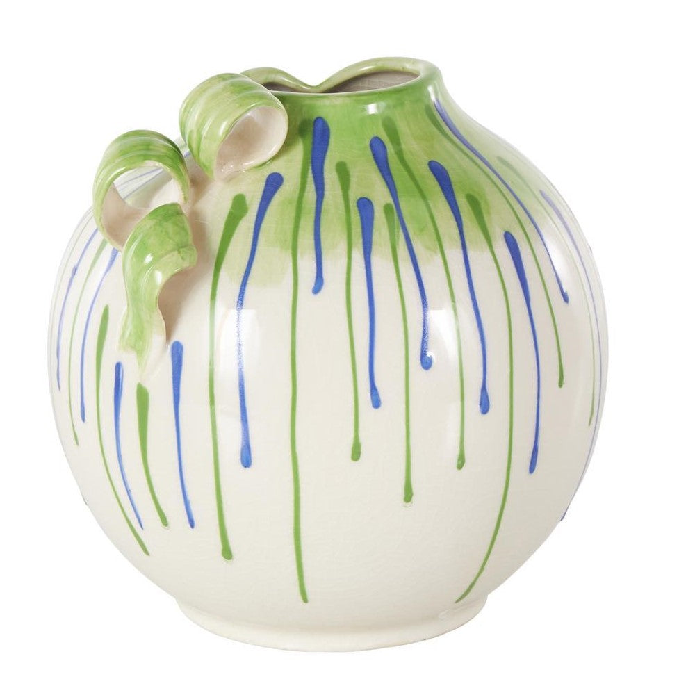 White vase with green and blue dripping lines, featuring curled handles.