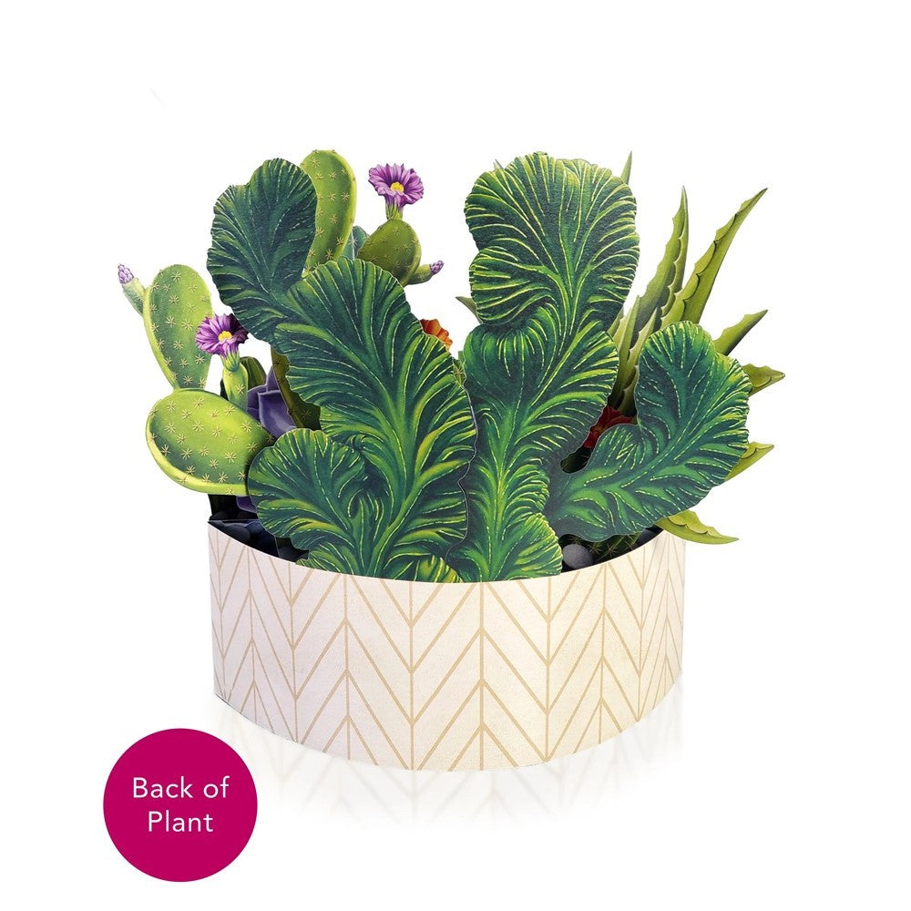 Paper craft cactus arrangement in a patterned pot.