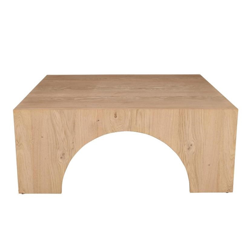 Wooden table with simple, modern design and arched cutout.