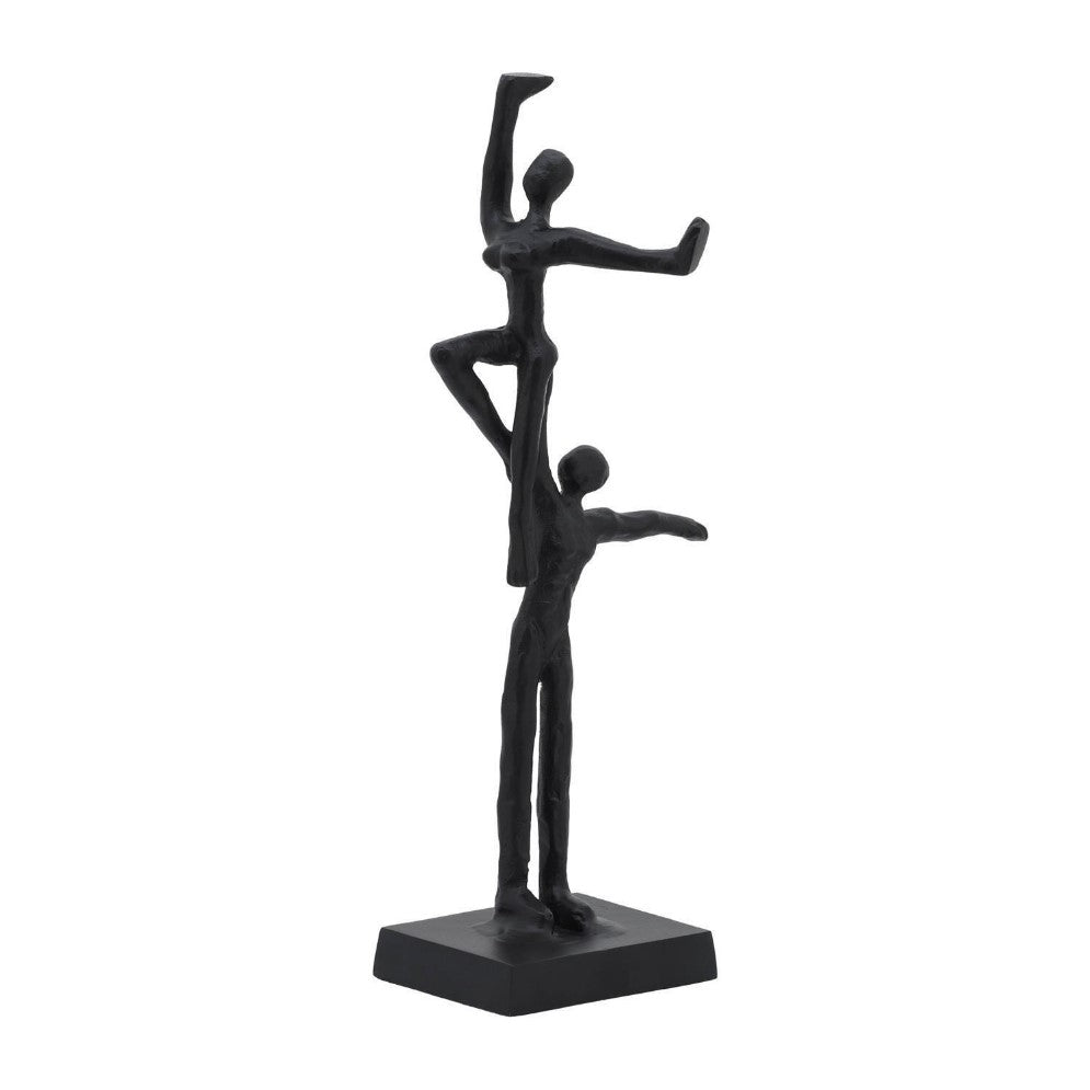 Two abstract human figures forming a balancing act on a square base.