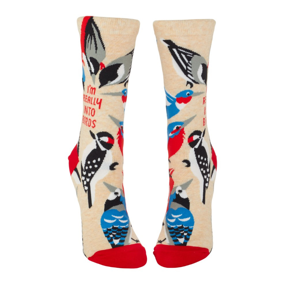 Colorful bird socks with red accents and a fun message.