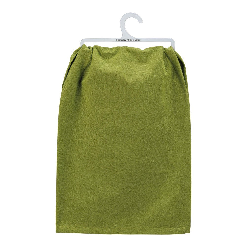 Green fabric hanging on a white hanger.