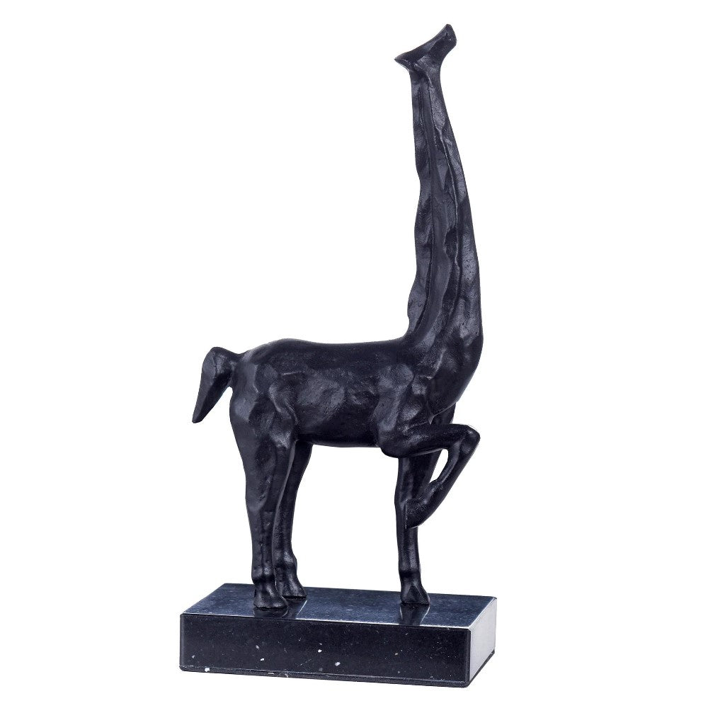 Abstract giraffe sculpture with an elongated neck on a base.
