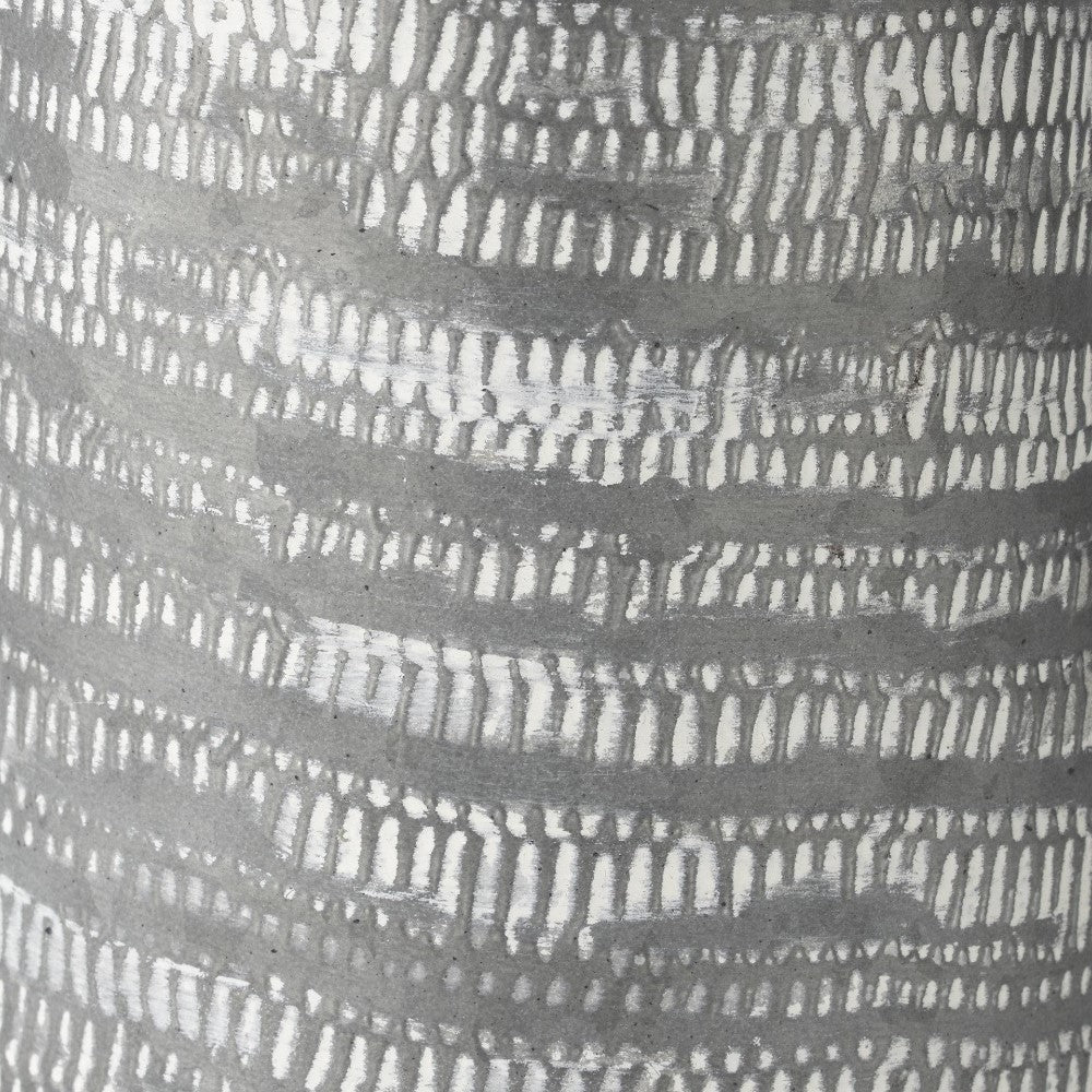 Abstract pattern with gray and white textured lines.