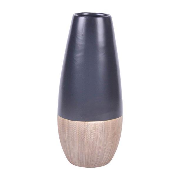Sleek black and beige vase with a modern design.
