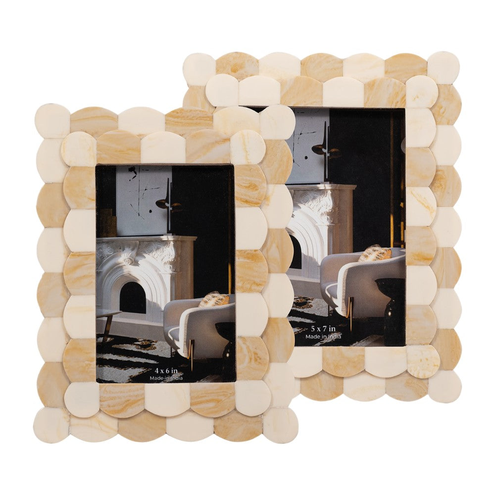 Two wooden photo frames with a pattern display interior fireplace images.