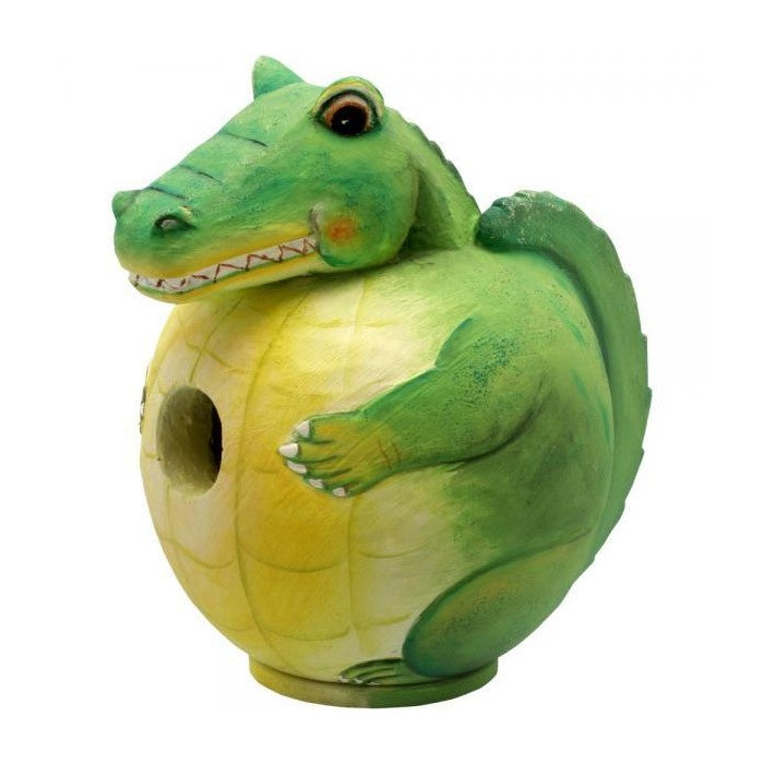 Green crocodile-shaped birdhouse with a round yellow belly.