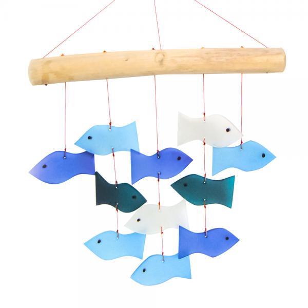 Colorful fish mobile hanging from a wooden branch.