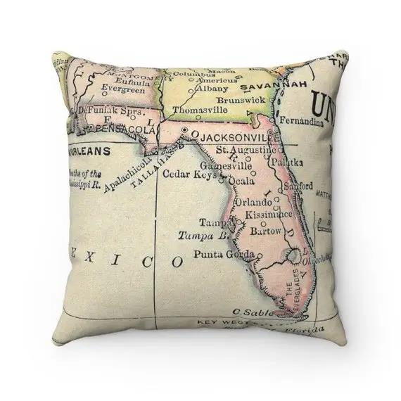 A pillow printed with a vintage map of Florida.