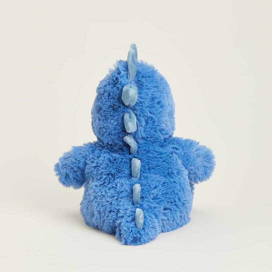 Fluffy blue dinosaur plushie viewed from behind.