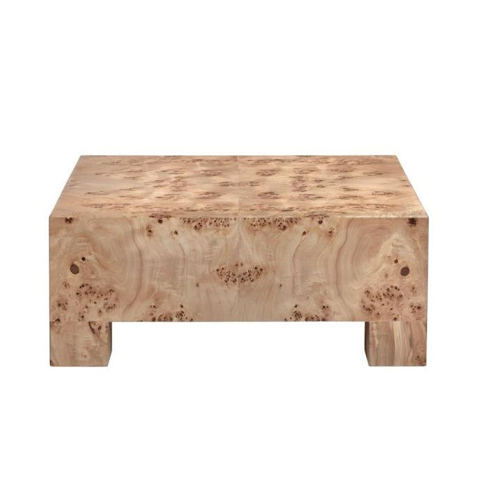 Light wood rectangular coffee table with a natural burl pattern.