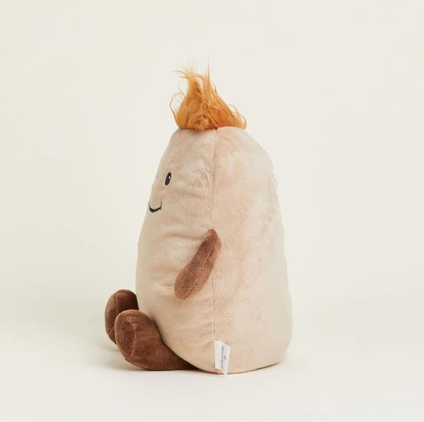 Fluffy potato-shaped toy with wild orange hair.