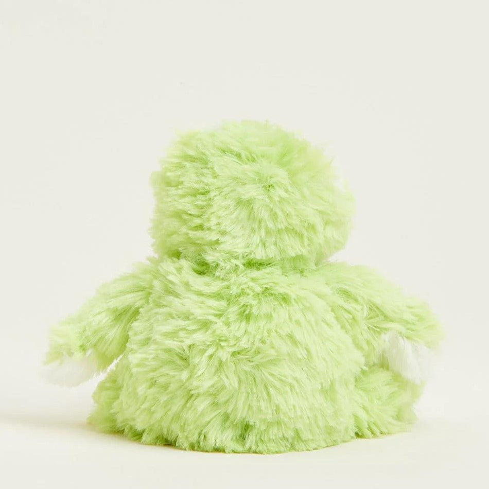 Fluffy green stuffed toy viewed from behind.