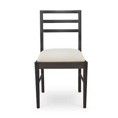 Black chair with a simple design and a light-colored cushioned seat.