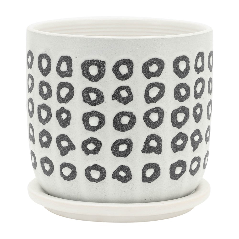 Dotted ceramic pot with matching saucer.