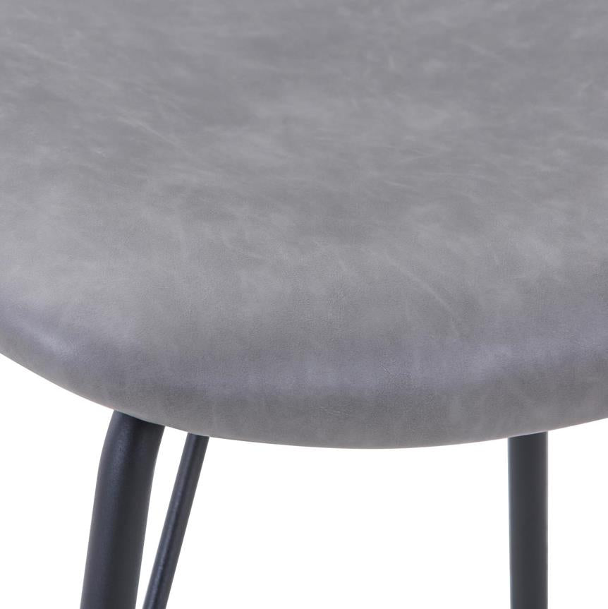 Gray cushion chair seat with black metal legs.