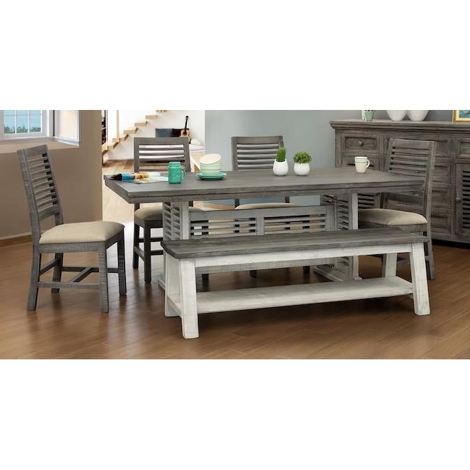 A rustic dining room set with a table, chairs, and bench on a wooden floor.