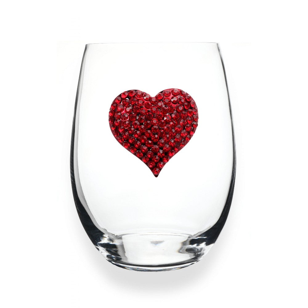 Clear glass with a red, sparkling heart design.