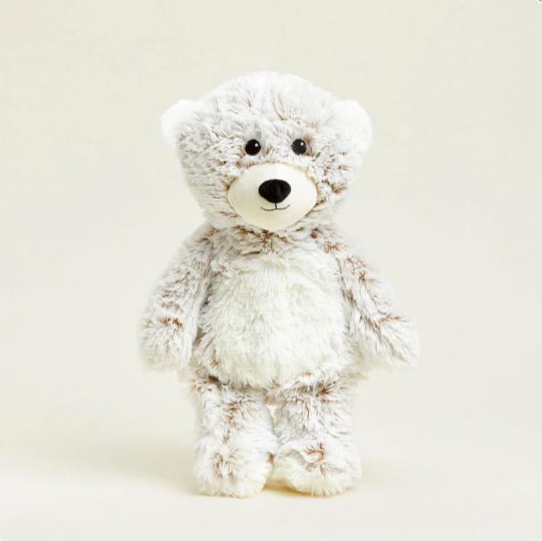 Fluffy white teddy bear standing upright.