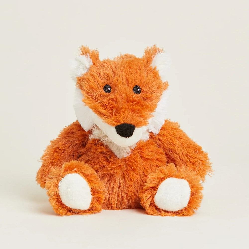 Cute fluffy fox plush with orange and white fur.