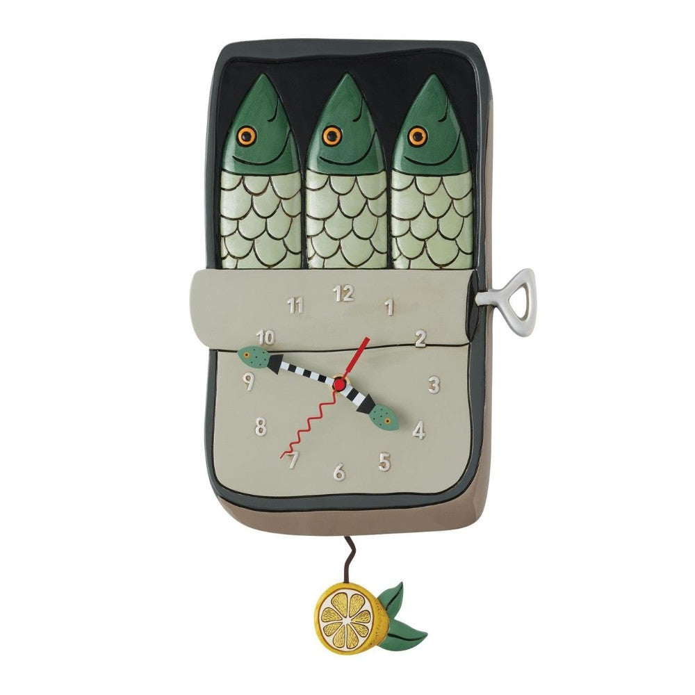 Quirky fish-themed clock with a lemon pendulum.