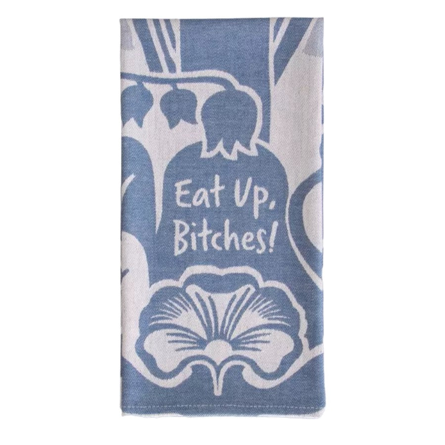 Decorative blue and white towel with bold text.