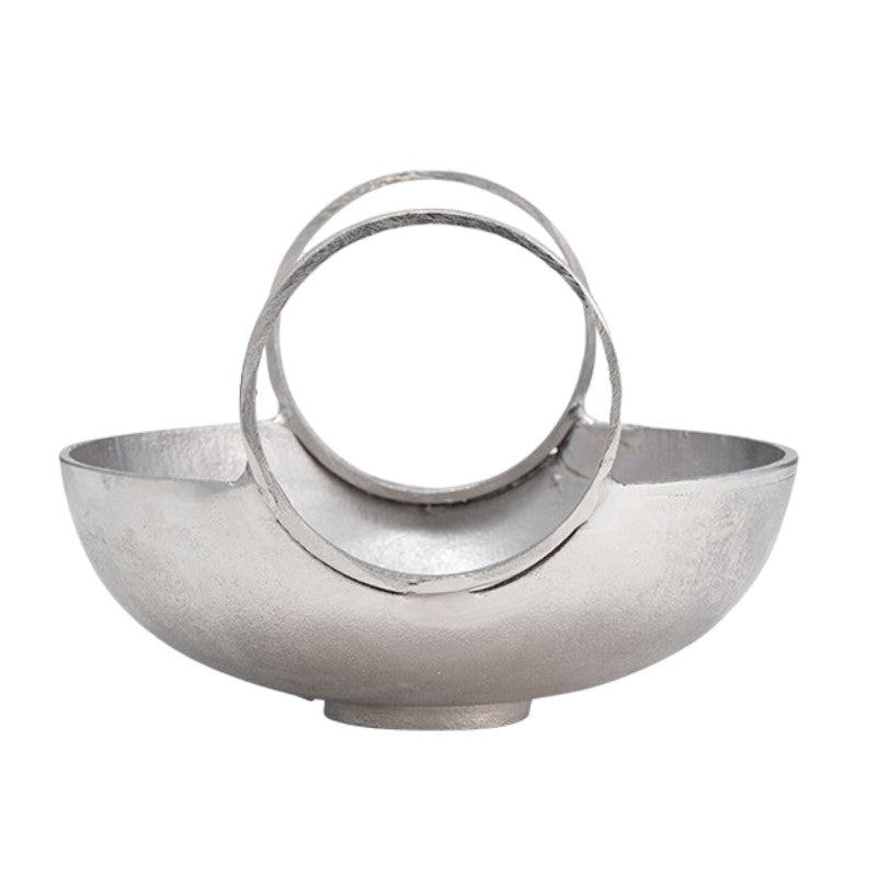 Silver metallic sculpture with circular design elements.