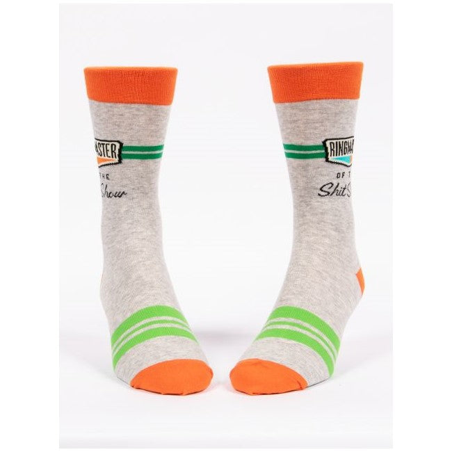 Gray socks with orange and green accents, cheeky text design.