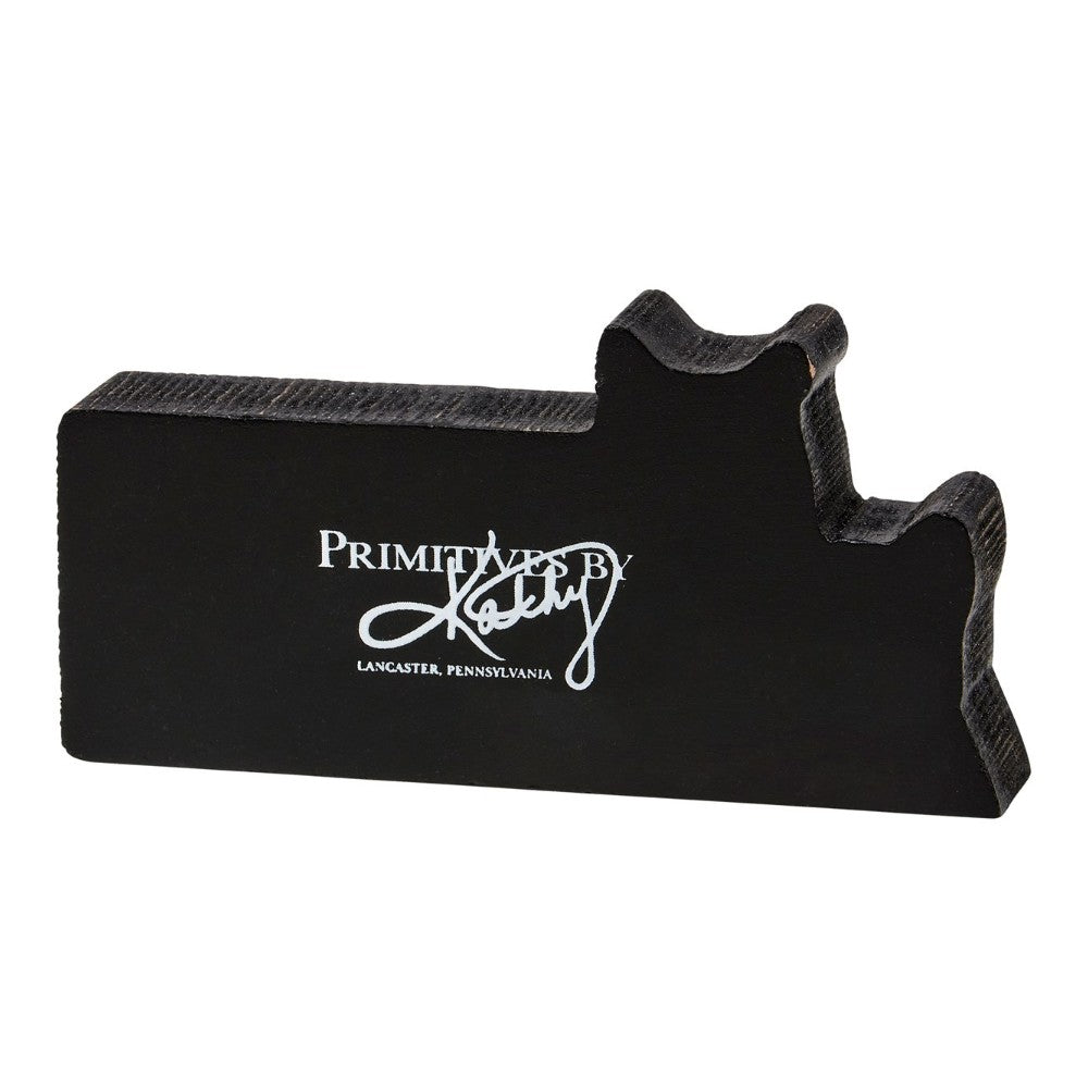 Black cat-shaped wooden block with text logo.