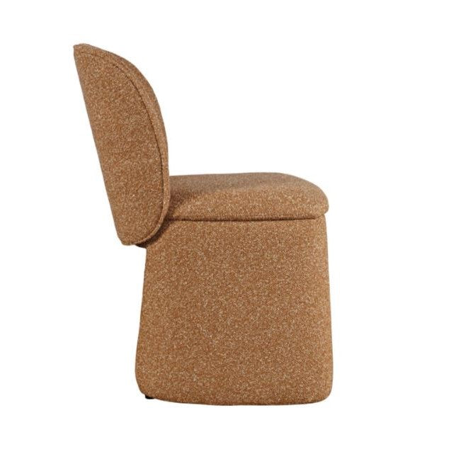 Side view of a brown upholstered chair with a curved backrest.