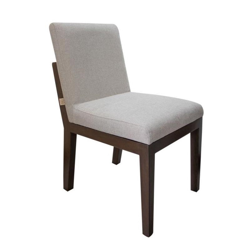 Gray upholstered chair with dark wooden legs.