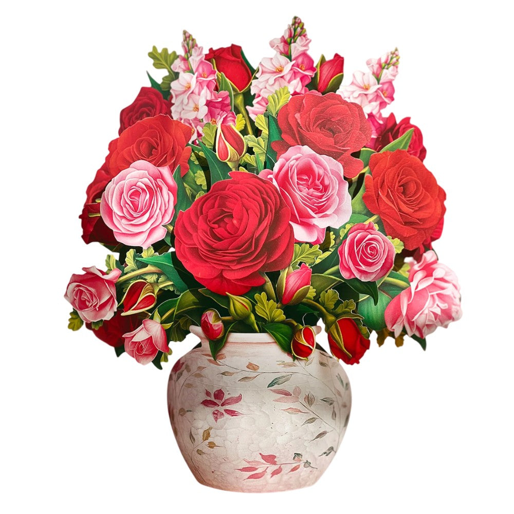 Colorful paper flower bouquet in a floral vase.