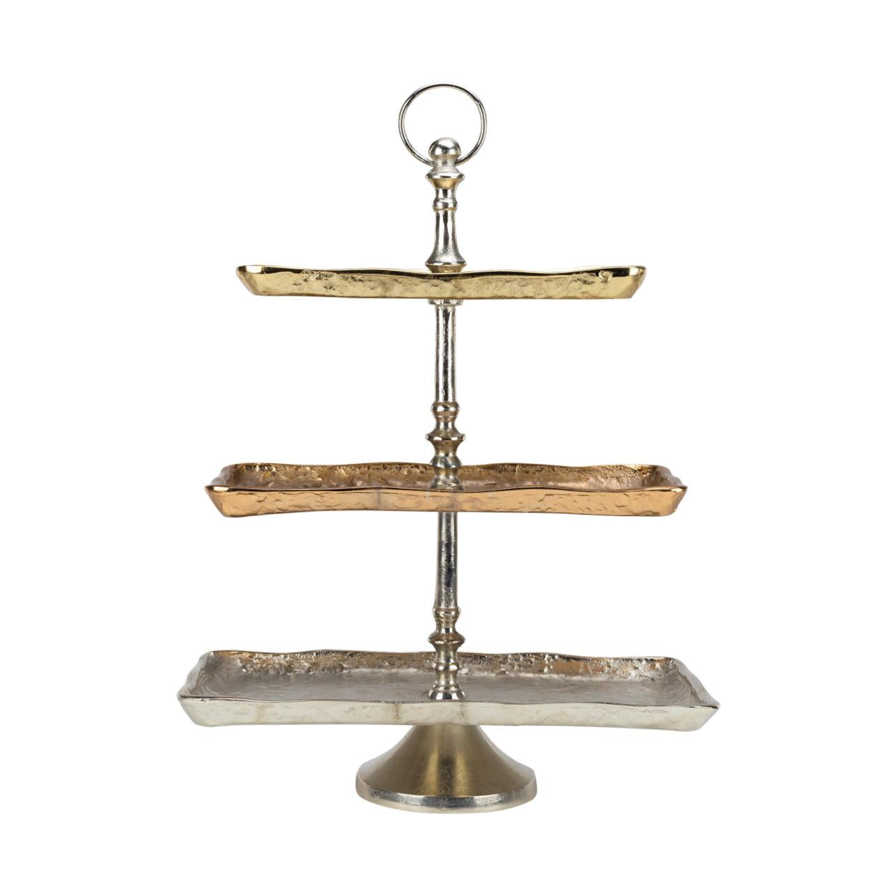 Three-tiered metallic serving stand with a ring handle.
