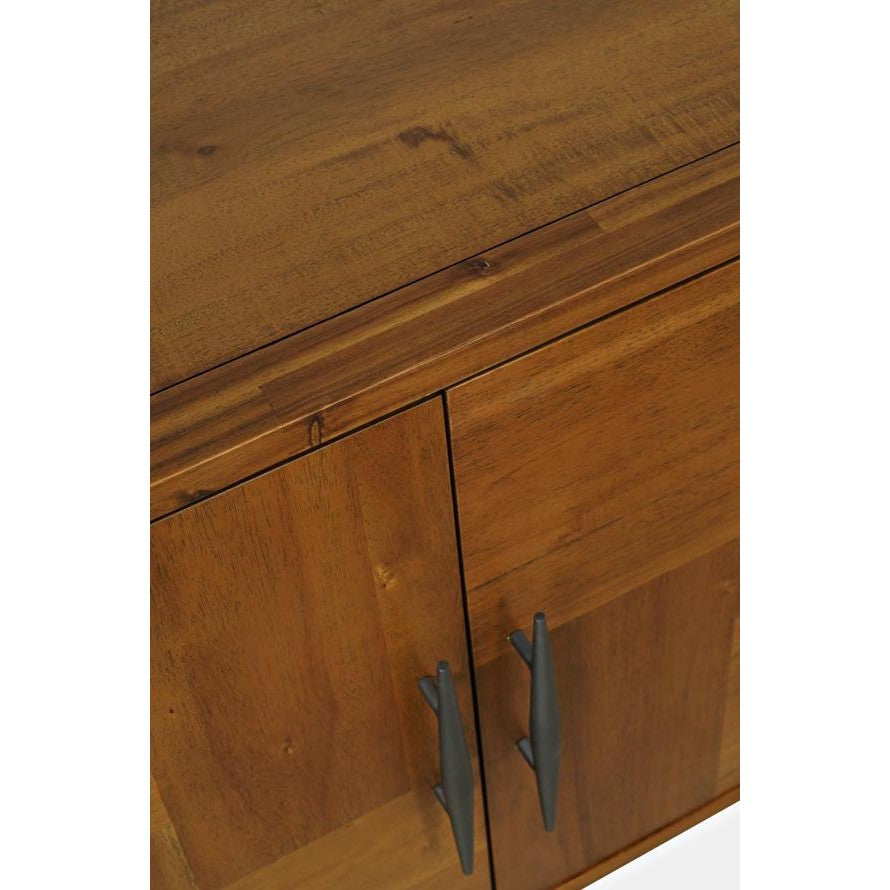Wooden cabinet with dark handles.