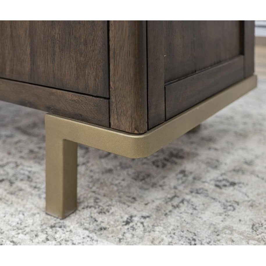 Wooden furniture with metal leg on a textured carpet.